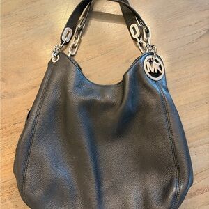 Michael Kors Black Hobo Bag with Silver Accents